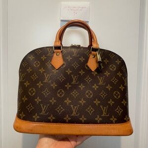 Louis Vuitton Brown Monogram Alma Handbag